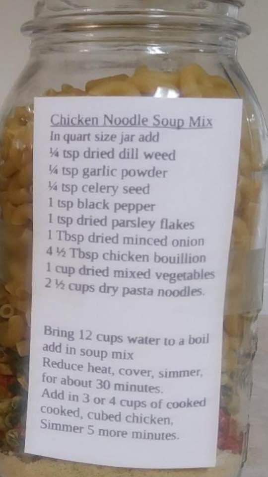 the ingredients for chicken noodle soup are in a glass jar with a label on it