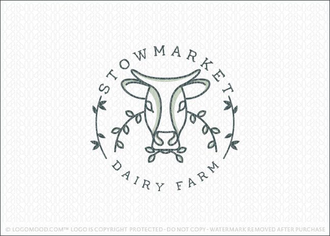 a logo for a dairy farm with an image of a cow's head in the center