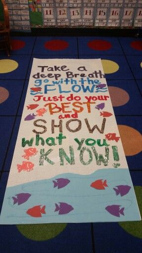 a colorful rug with words written on it