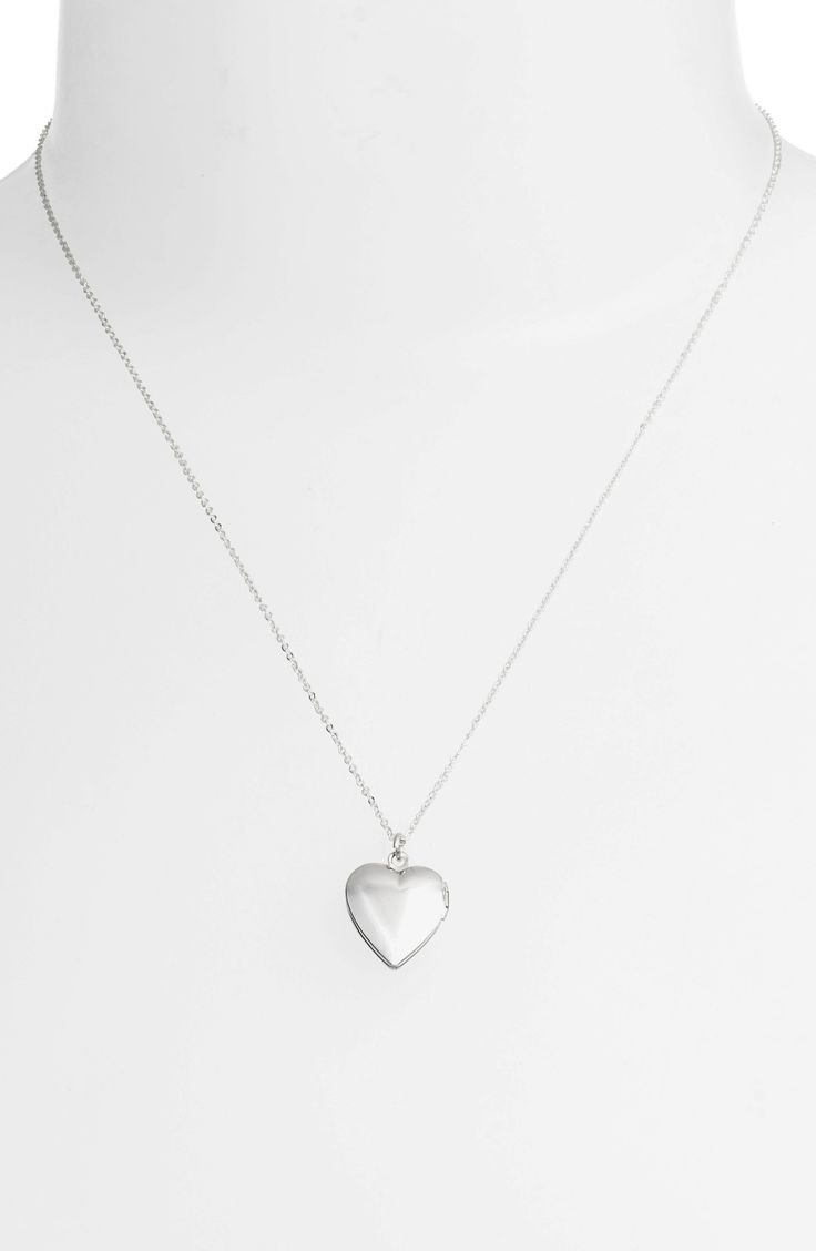 Polished to a brilliant shine, this American-made locket keeps a special photo or memento close to your heart. 18" length; 3/4" x 5/8" pendant Lobster clasp closure Handcrafted Sterling silver or 14k-gold-fill chain/rhodium plate or 24k-gold plate locket Made in the USA Heart Locket Necklace, Heart Locket, Locket Necklace, Women Set, On Set, Roxy, Rhodium Plated, Locket, Gold Filled