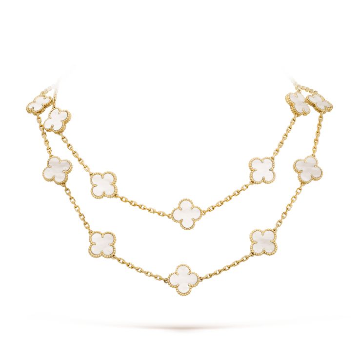 Indulge in luxury with our Clover 20 Motifs White Mop Gold Necklace. Each jewelry piece features 20 unique motifs, crafted with white mother of pearl and accented with gold. Elegant and exclusive, this necklace is the perfect accessory for any sophisticated and tasteful wardrobe. ADDITIONAL INFORMATION Color: Gold Stone: White Mop Ref. vcarp34802 Material:- 925 Sterling Silver - 18k Gold Plated- 18k Real Gold ( contact us via instagram) Length of chain : 84cm Our replica products are committed t Alhambra Van Cleef, Cleef And Arpels Jewelry, Van Cleef And Arpels Jewelry, Van Cleef & Arpels, Van Cleef And Arpels, Classic Bracelets, Clover Necklace, Expensive Jewelry, Modern Necklaces