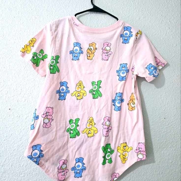 Pink Carebear Shirt Size Medium New With Tags Summer Bear Print Short Sleeve T-shirt, Summer Bear Print Crew Neck T-shirt, Playful Cotton Tops With Bear Print, Cotton Tops With Bear Print And Relaxed Fit, Summer Bear Print Short Sleeve Tops, Cute Bear Print Short Sleeve Tops, Cute Bear Print Top With Short Sleeves, Cute Short Sleeve Tops With Bear Print, Cute Short Sleeve Top With Bear Print