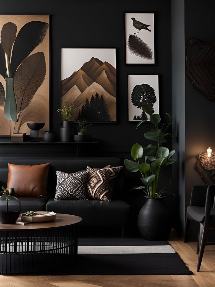 a living room with black walls and pictures on the wall, plants in vases