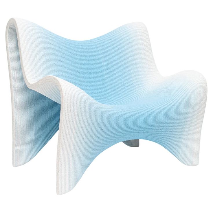 a blue and white chair sitting next to each other