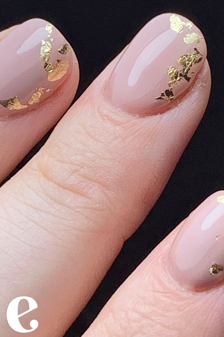 Short square nude nails, with subtle gold nail art. Gold leaf is the perfect for subtle nail art. Short Nail Designs With Gold Flakes, Gold Leaf Nails Short, Natural Nails With Gold Foil, Short Nails Gold Flakes, Short Nails With Foil Flakes, Pink Gold Leaf Nails, Nails With Gold Flakes Short, Gold Flake Nails Short, Gold Leaf Nails Acrylic