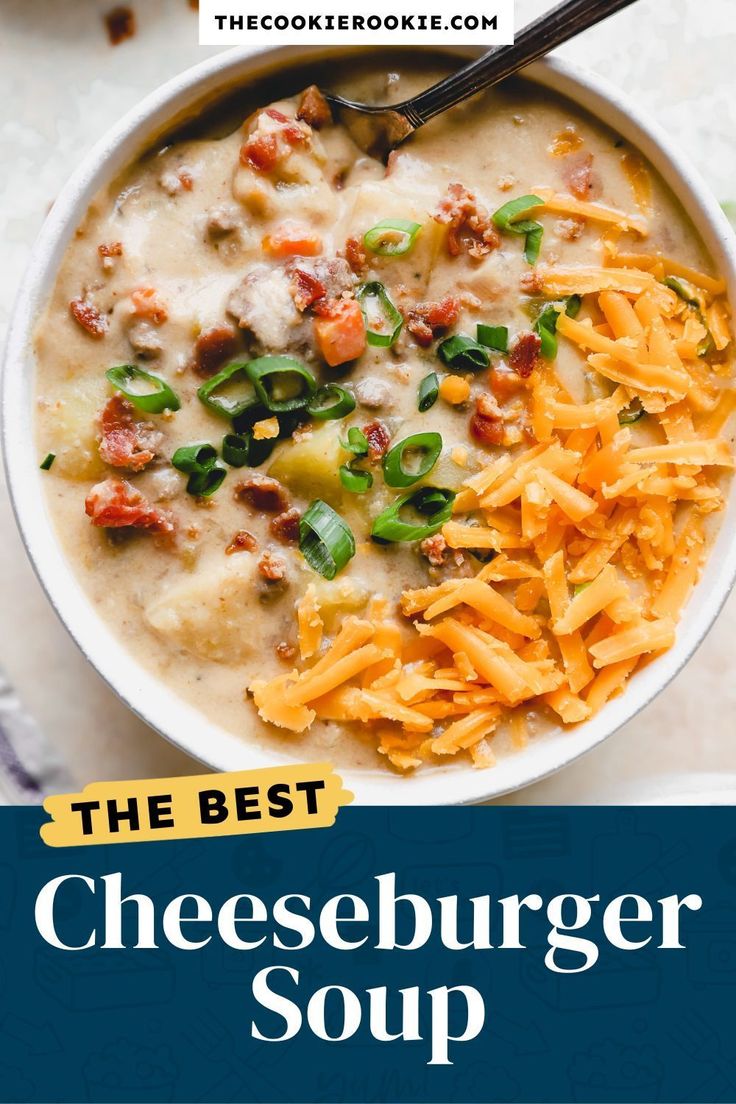 the best cheeseburger soup in a white bowl with cheesy toppings