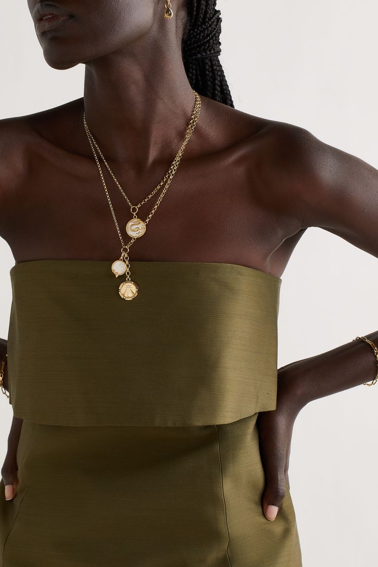 Foundrae's pieces are centered around symbols that connote strength and wellness. This 18-karat gold necklace is strung with two charms - the diamond-encrusted 'Mind Body Soul' pendant represents generations of powerful women, while the enameled 'Wholeness' one is bordered by an ouroboros to signify rejuvenation. Luxury Gold Plated Jewelry With Pearl Charm, Luxury Gold-plated Jewelry With Pearl Charm, Luxury Gold-plated Pearl Charm Jewelry, Luxury Gold-tone Jewelry With Pearl Pendant, Luxury Pearl Pendant Chain Necklace, Luxury Long Necklace With Pearl Charm, Luxury Long Pearl Charm Necklace, Elegant Pendant Charm Necklaces With Coin, Luxury Yellow Gold Charm Necklaces With Detachable Pendant