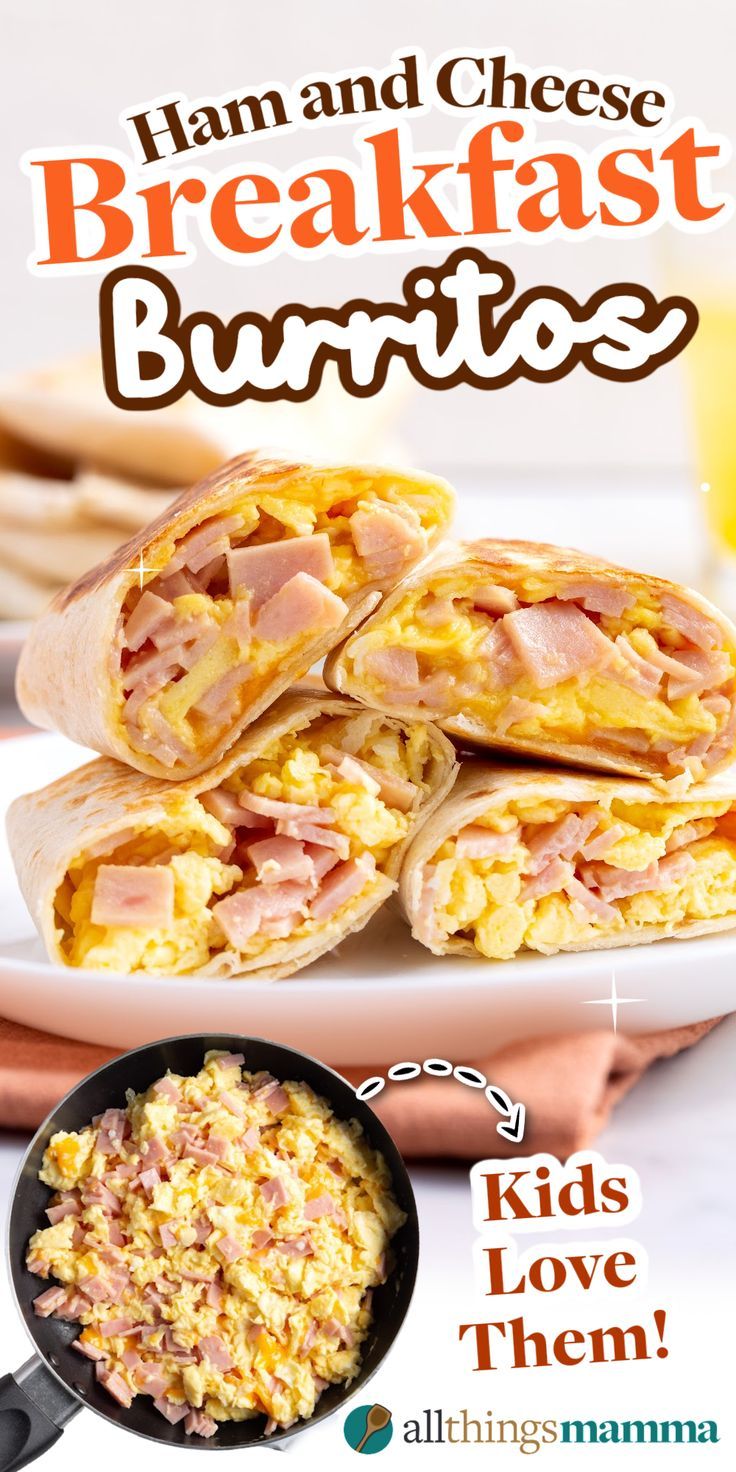 breakfast burritos with ham and cheese in the middle, on a white plate