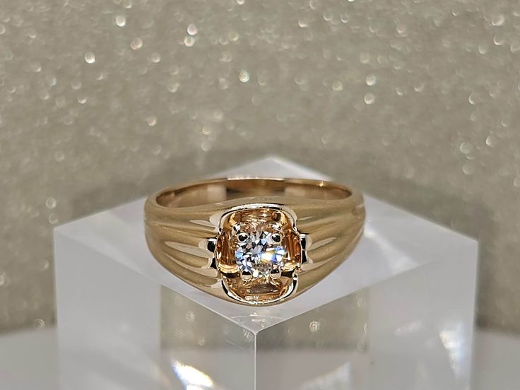 Circa 1980, a 14k yellow gold and diamond ring, finger size 8.5. This ring features a 4.4mm (0.33cts estimated) round brilliant cut diamond H color VS clarity. 9.8mm wide at top. Stamped 14k. Weight is 5.7 grams. This ring is in very good to excellent condition. Thanks for looking. ERA - Circa 1980, Vintage METAL / MATERIAL - 14k yellow gold  MARKINGS / HISTORY - Stamped 14k CONDITION - The overall condition is very good to excellent! A true representation of 1980s-era jewelry! SIZE / MEASUREMEN 14k Gold Cluster Ring With Single Diamond, Classic Yellow Gold Engraved Ring With Single Diamond, Classic Round Cut Diamond Ring Stamped 14k, Formal Single Diamond Ring, Classic 14k Stamped Promise Diamond Ring, Fine Jewelry 14k Gold Diamond Ring, Classic Yellow Gold Dome Ring With Center Stone, Yellow Gold Dome Ring With Diamond Center Stone, Classic Round Cut Diamond Ring