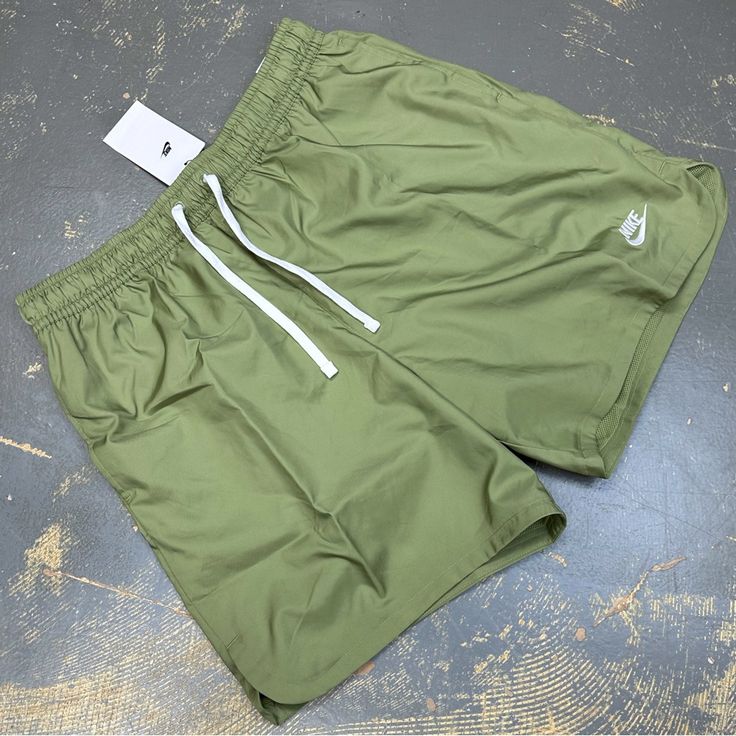 I’m Selling A Brand New With Tags Nike Essentials Sportswear Nsw Men’s Hybrid Shorts In Alligator Green With White Embroidered Logo! Features Drawstrings And Side Pockets. Adult Large / Tall Width Measures 16 Inches Hip To Hip Length Measures 18.5 Inches Hip To Leg Opening Inseam Measures 7 Inches Nike Id Dm6829-334 Msrp $50 Click Add To Bundlebelow To Receive An Offer! Combine Items And Save On Shipping! Green Relaxed Fit Sports Bottoms, Green Sporty Athletic Shorts With Side Pockets, Green Activewear With Side Pockets For Sports, Sporty Green Athletic Shorts With Side Pockets, Green Activewear With Side Pockets For Gym, Green Relaxed Fit Gym Bottoms, Green Relaxed Fit Bottoms For Gym, Nike Green Sportswear Bottoms, Green Workout Shorts With Side Pockets