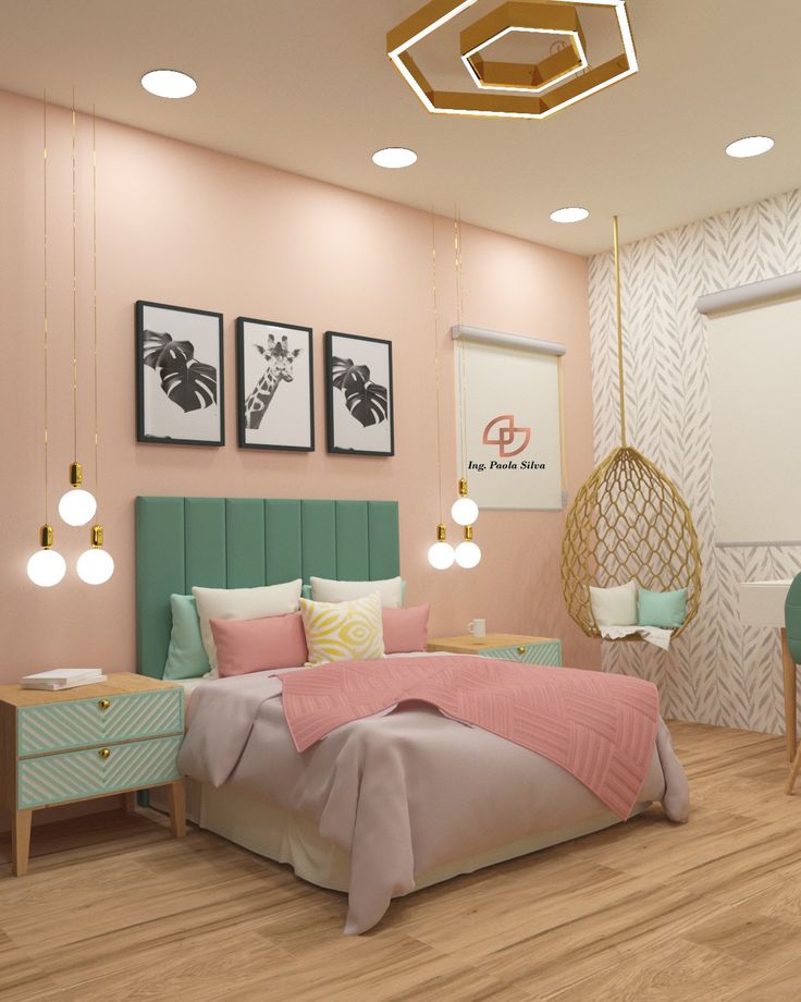 a bedroom decorated in pastel colors with hanging lights above the bed and chairs on either side