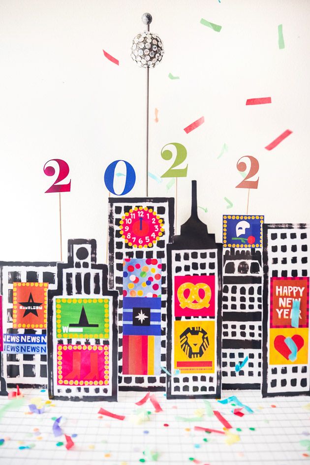 a group of buildings with numbers and confetti on them