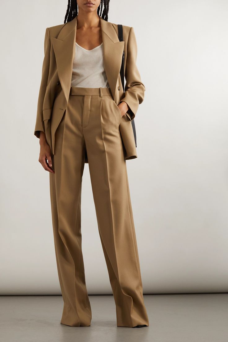 Living up to the brand's storied reputation, SAINT LAURENT's tailoring remains iconic in the hands of Anthony Vaccarello. Cut from wool-twill that'll last even longer if you dry clean it sparingly, these chic pants have exaggerated flared legs. Wear yours with tie-detailed blouses, classic stripes or the full suit with the matching blazer. Neutral Work Outfit Business Casual, Wealthy Women Fashion, Julia 1984, Tailored Trousers Women, Skirt Outfits For Work, Tonal Dressing, Corporate Girly, Catalog Fashion, Estilo Kardashian