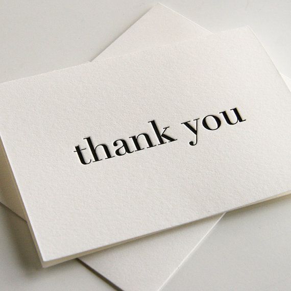 two folded thank cards with the words thank you on one side and the word thank you on the other