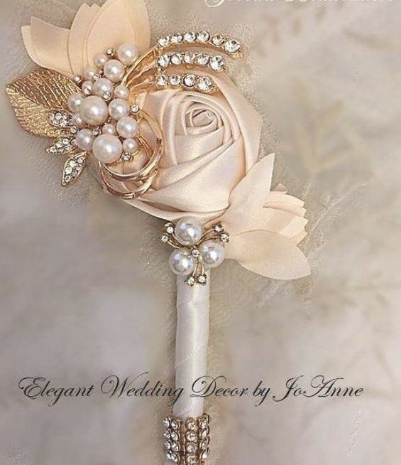 a wedding boutonniere with pearls and flowers