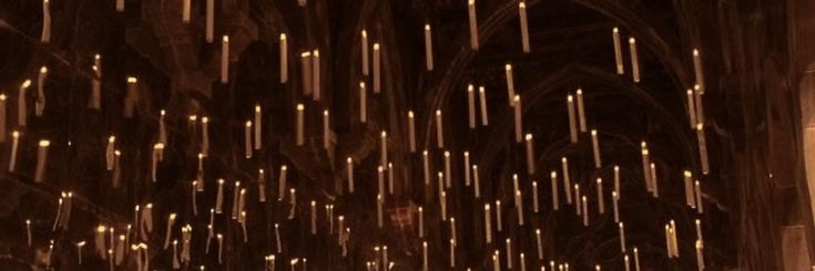 an image of the inside of a building with lights hanging from it's ceiling