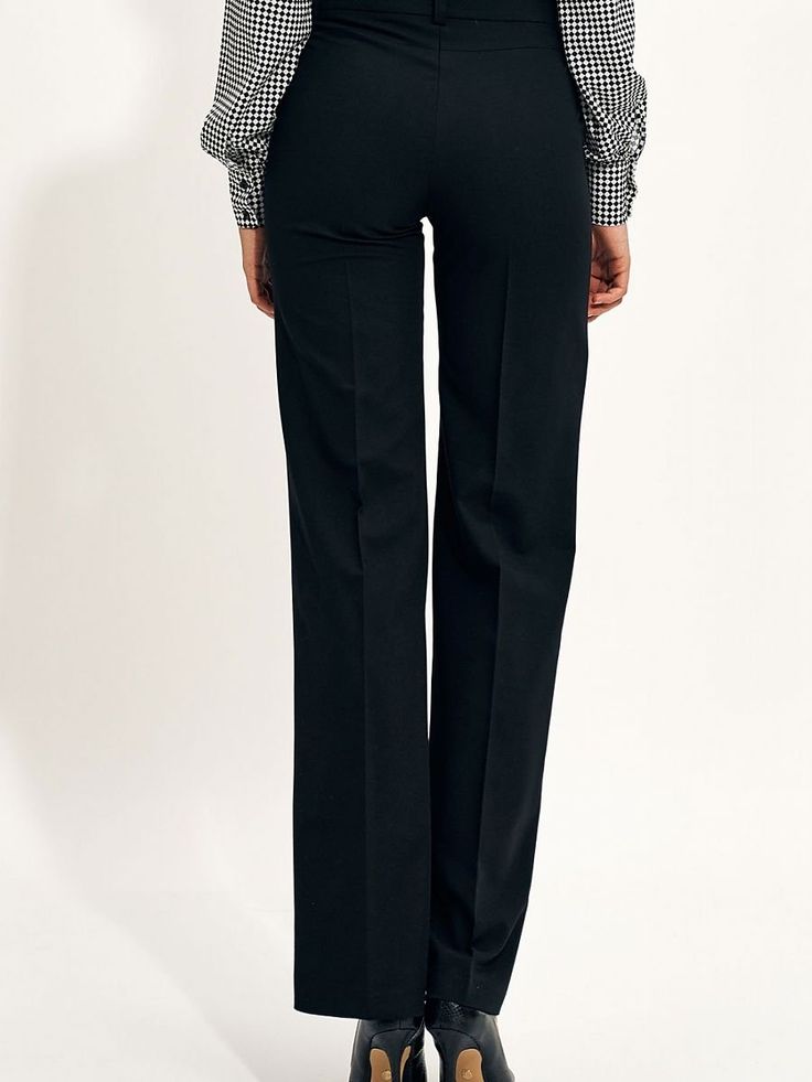 After many seasons of the dominance of slim-fitting pants, models with wide legs, the so-called wide leg, have returned. Pants with loose legs look perfect in a set with a jacket of the same color, creating an elegant total look. The pants have a raised top, so they optically lengthen the silhouette. Spandex 2.1 % Polyester 74.8 % Viscose 23.1 % Size Lenght Hips width Waist width 36 106 cm 95 cm 73 cm 38 106.5 cm 99 cm 77 cm 40 107 cm 103 cm 81 cm 42 107.5 cm 107 cm 85 cm 44 108 cm 111 cm 89 cm Black Wide Leg Trousers, Total Look, La Fashion, Suit Separates, Wide Legs, Black Suits, Trouser Suits, Tailored Trousers, Ethical Fashion