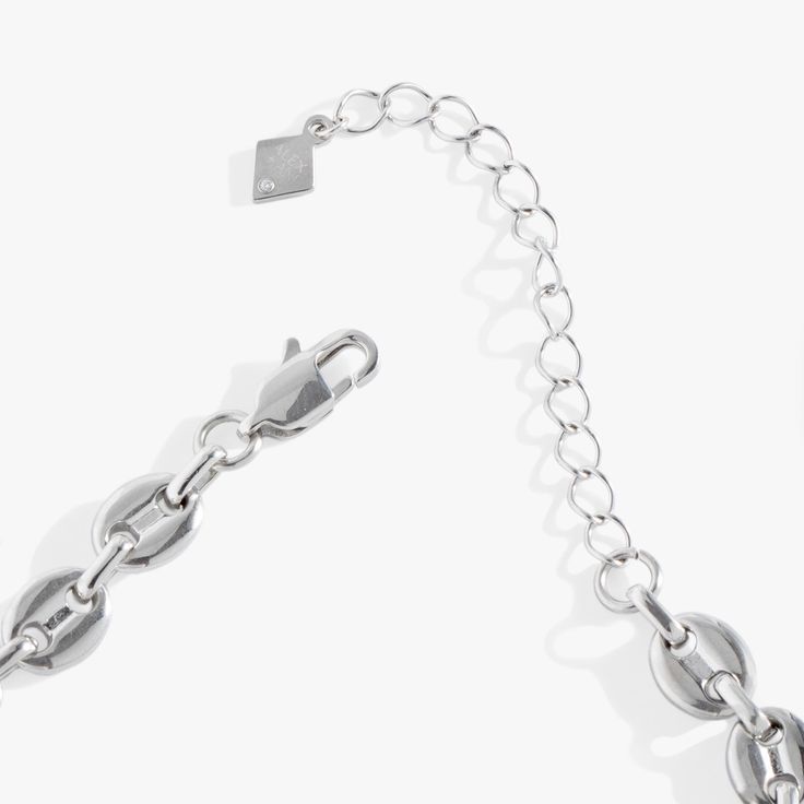 Crafted to be worn every day, this stainless steel necklace is tarnish-resistant, so you can feel confident when you wear it on repeat. Inspired by the timeless elegance of nautical design, this chain necklace features interlocking links that mirror the sturdy chains used on ships. It's a perfect blend of boldness and sophistication, making it a standout style for any OOTD. Oval Link Stainless Steel Cable Chain Bracelet, Silver Chain Bracelet With Adjustable Rectangular Links, White Gold Cable Chain Bracelet, Metal Chain Link Necklace With Adjustable Chain, Stainless Steel Chain Link Bracelet With Lobster Clasp, Metal Cable Chain Necklaces, Silver Cable Chain Link Bracelet, Silver Cable Chain Link Necklace, Stainless Steel Link Necklace With Silver Chain