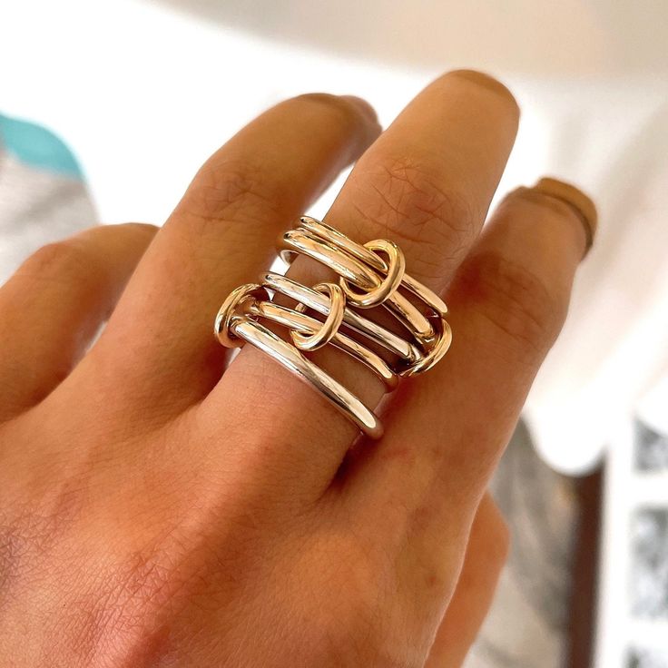 We Customized this ring for a client, now you are welcome to buy it too! Custom connected ring Round, Heavy Fit, Mother's Day Gift 14ga round gold filled 1.6mm 10ga gold filled round band 2.6mm 12ga 925 ss round band2.0mm 12ga gold filled half round band 2mm 10ga 925 ss round 2.6mm With four gold filled connected rings Please Note: Our gold filled rings may have a visible solder mark and it may be brighter than the ring as we use 14k gold for soldering. This is not a Quality Issue but limitation and nature of materials & process we use to make handmade jewelry. We gently polish our jewelry so that the 14k gold layer stays intact and the jewelry lasts longer. We are very sorry, we will NOT be able to accept any returns in this regard. Thank you for your understanding and supporting our smal Modern Gold Rings Nickel Free, Gold Sterling Silver Stackable Rings With Open Band, Unique Gold-colored Sterling Silver Midi Rings, Spinelli Ring, Connected Rings, 2024 Wishlist, Mixed Metal Rings, Soldering Jewelry, Gold Filled Ring