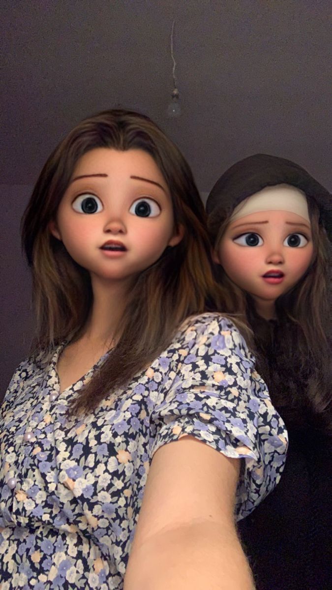 two dolls are standing next to each other