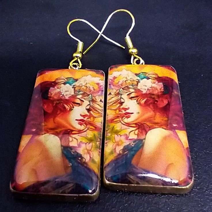 These image transfer earrings are ready to ship.  The earrings are handcrafted from polymer clay and uses my own image transfer technique. They have a top layer of resin.  I have only one pair of these earrings. Artistic Handmade Rectangular Earrings, Handmade Artistic Rectangular Earrings, Hand Painted Resin Earrings For Gifts, Hand Painted Resin Earrings As Gift, Artistic Resin Earrings For Pierced Ears, Handmade Artsy Resin Earrings, Artistic Hand Painted Polymer Clay Earrings, Hand Painted Rectangular Earrings Gift, Handmade Vintage Resin Earrings