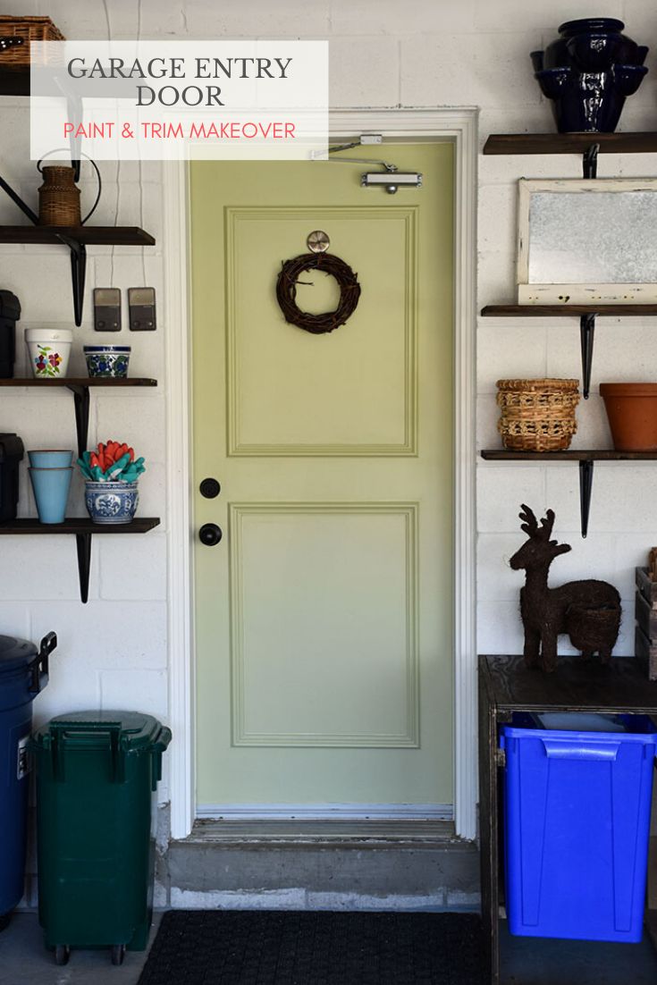 a garage entry door painted and trim makeover