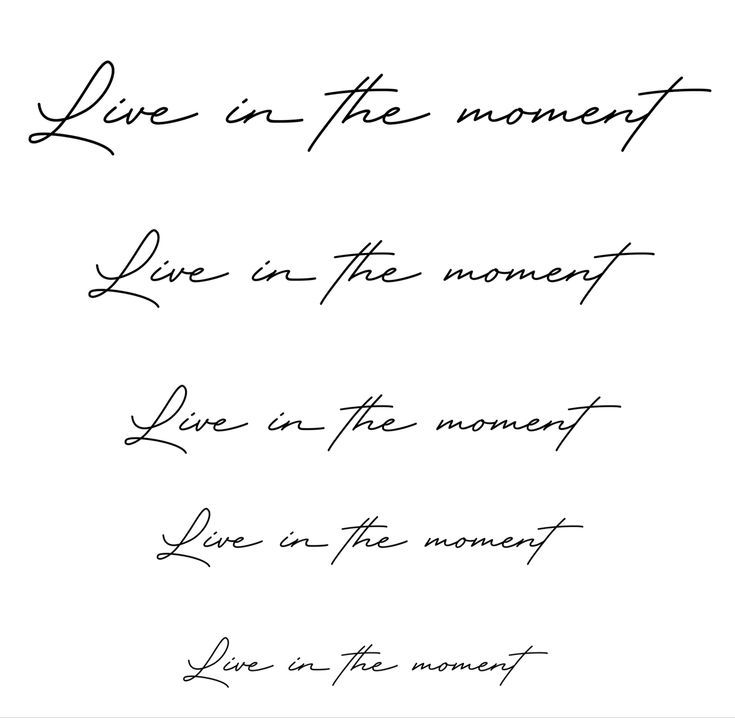 the words live in the moment and love in the moment are written on white paper