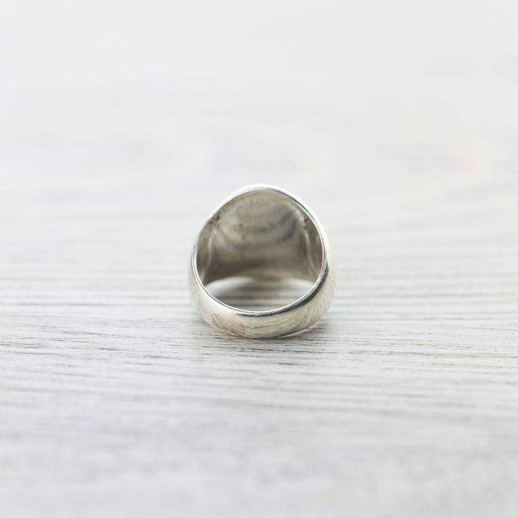 Our Eternal Knot signet ring is handcrafted by a fair-trade group of silversmiths in Nepal. Each sterling silver ring is stamped with the ancient symbol and polished by hand. Signet rings are not only appreciated for their aesthetic appeal but also for the symbolism or significance to the wearer. Historically used as a signature or a symbol of ones identity, these unique rings can carry a lot of meaning. The Endless, or Eternal Knot has special meaning throughout many cultures and can serve as a Symbolic Sterling Silver Stamped Signet Ring, Symbolic Stamped Sterling Silver Signet Ring, Symbolic Stamped Signet Ring In Sterling Silver, Spiritual Open Signet Ring With Polished Finish, Adjustable Hallmarked Spiritual Signet Ring, Timeless Silver Initial Ring, Adjustable Symbolic Signet Ring Stamped 925, Spiritual Round Signet Ring With Polished Finish, Silver Signet Ring Stamped 925 For Everyday