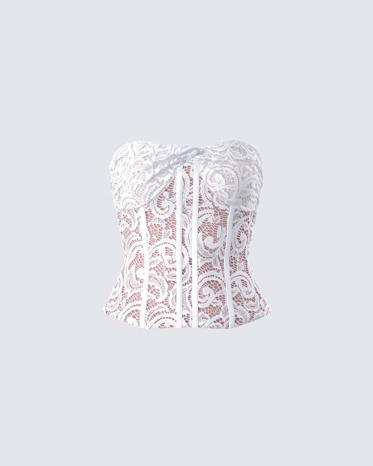 Slip into something magical with this white lace corset top ✨ With twist detailing, boning, and bust pads, this lined stretch lace piece is the perfect staple piece full of whimsy 🤍 Feminine Underbust Corset With Built-in Bra, Lace Corset With Sweetheart Neckline And Built-in Bra, Feminine Wedding Corset With Built-in Bra, Chic White Corset With Built-in Bra, Elegant Overbust Lace Bodice, Elegant Lace Overbust Bodice, Elegant Underwire Corset With Lace Trim, Fitted Overbust Lace Bodice, Underbust Lace Bodice With Lace Trim