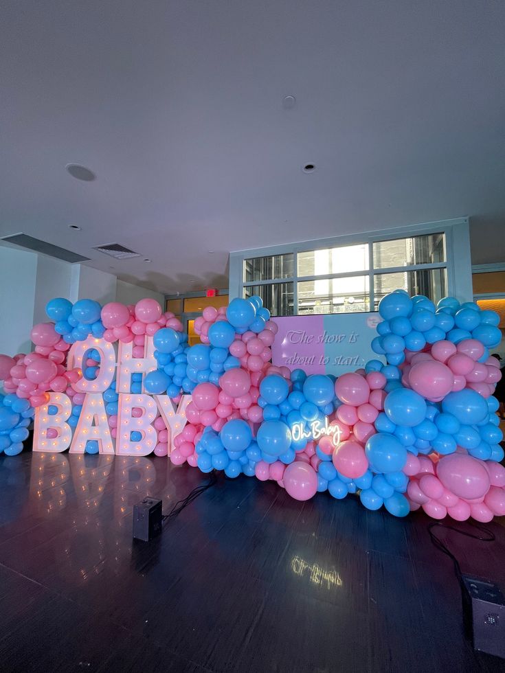 an image of balloons that say oh baby