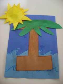 a piece of paper with a palm tree and sun on it sitting on a table