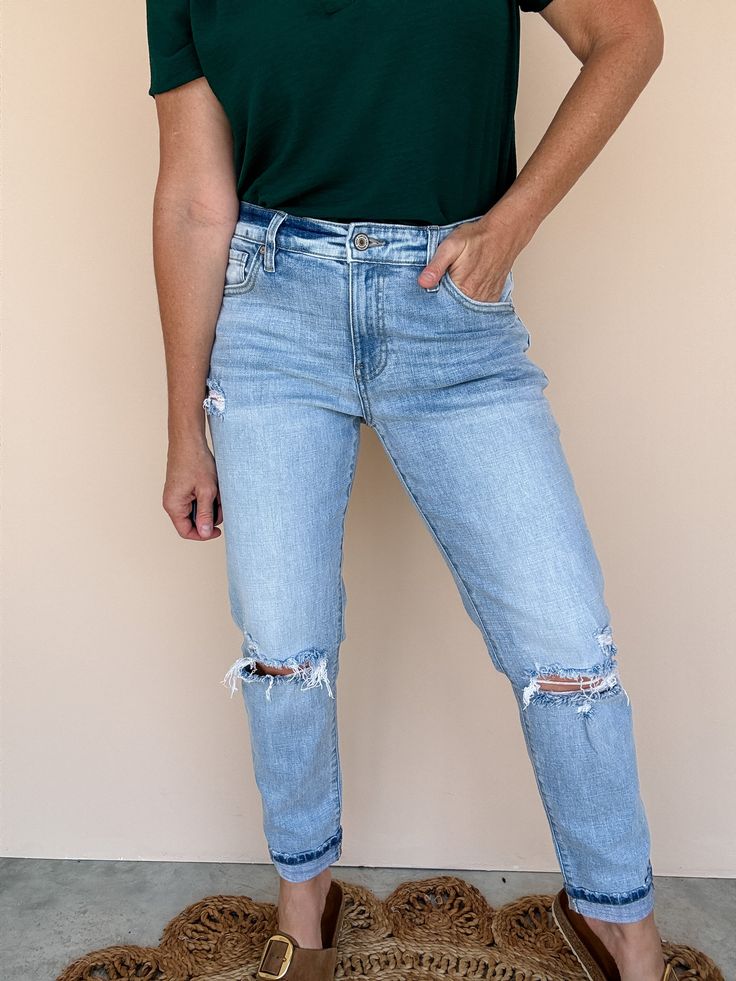 Our new 'Sunfaded Midrise Boyfriend' jeans are designed with a relaxed leg and cuff for the effortless modern look. They feature a mid rise fit, distressing on the thigh, knees, and back pockets and frayed bottom hem for a trendy look - and the light wash is perfect for any spring and summer outfit! Kancan brand denim True to size Rise 9.5", Inseam 27" in size 5/26 99% Cotton, 1% Spandex Machine wash cold and tumble dry low High Rise Washed Blue Distressed Cropped Jeans, Distressed High Rise Cropped Jeans In Washed Blue, High Rise Distressed Washed Blue Cropped Jeans, Everyday High Rise Distressed Jeans, Faded Distressed Denim Cropped Jeans, Trendy Light Wash Cropped Jeans With Frayed Hem, Light Wash Distressed Cropped Denim Jeans, Faded Ripped Everyday Bottoms, Everyday Faded Ripped Bottoms