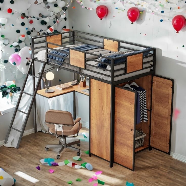 a loft bed with a desk underneath it and lots of confetti on the walls