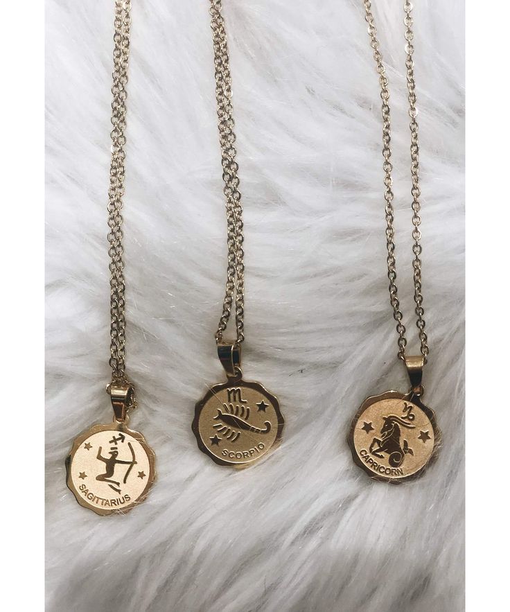 BESTSELLER-RESTOCKED! Antique coin style medallion necklace, featuring the twelve Zodiac signs, hangs from a sturdy yet shimmering gold chain.Perfect for Layering or wearing alone. Tarnish Free. 18Kt Gold Plating. Stainless Steel We don’t want your special moment to fade. To maintain the quality of your new Mathew & Marie Co. jewelry, please:• Do not wear it to the pool, spa, or the beach Sugarhigh Lovestoned, Leo Necklace Zodiac, Antique Coins, Sagittarius And Capricorn, Leo And Virgo, Zodiac Necklace, Virgo And Libra, Taurus And Gemini, Medallion Necklace