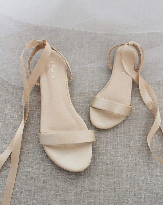 Champagne Satin Flat Sandal With Ballerina Lace Up Bridesmaid | Etsy Champagne Shoes For Bridesmaids, Champagne Wedding Shoes Bridemaid, Silver Bridesmaid Dress And Shoes, Luxury Champagne Chic Sandals, Chic Luxury Champagne Sandals, Luxury Chic Champagne Sandals, Cheap Flat Sandals With Heel Strap, Cheap Cream Party Sandals, Luxury Beige Formal Flats