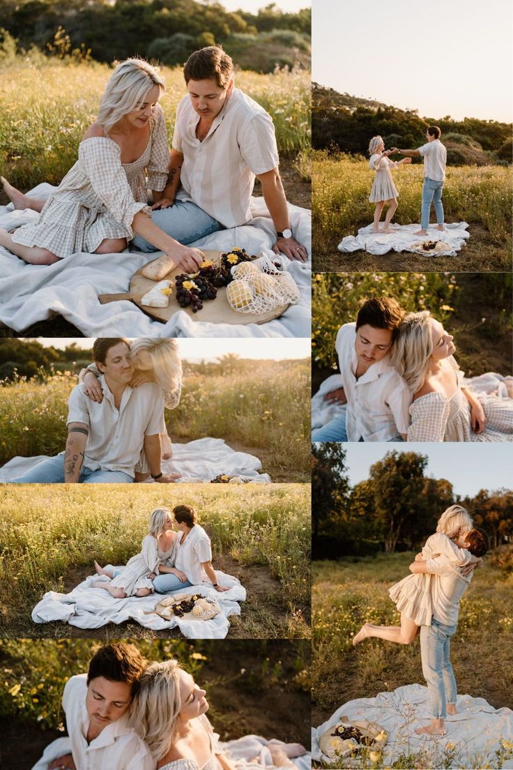 a man and woman sitting on top of a blanket in the middle of a field