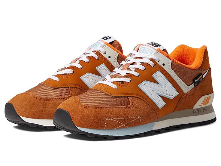 New Balance Classics ML574v2 - Men's Running Shoes : Rust/Morning Fog : Add a vintage runner design to your wardrobe with the iconic silhouette of the New Balance Classics ML574v2 sneakers. Casual shoes with suede and mesh or textile uppers in a sporty silhouette. Foam-padded collar and tongue. Soft linings and a removable foam insole provide all-day comfort. Traditional lace-up closure. TPU heel insert for extra support. ENCAP&,#174, midsole for cushioning. Durable rubber outsole. Imported. Mea Suede Running Shoes With Boost Midsole For Streetwear, Suede Running Shoes With Rubber Sole For Streetwear, Low-top Suede Running Shoes With Rubber Waffle Outsoles, Suede Low-top Running Shoes With Rubber Waffle Outsoles, Sporty Suede Sneakers For Streetwear, Orange Running Shoes With Rubber Waffle Outsoles For Jogging, High-top Suede Running Shoes For Streetwear, Sporty Suede Running Shoes For Streetwear, Orange Running Sneakers With Rubber Waffle Outsoles