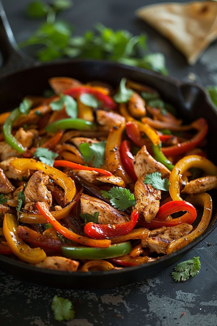 Sizzling fajitas with chicken, bell peppers, and cilantro in a skillet. Bell Pepper Chicken Recipes, Chicken Fajita, Chicken Bell Pepper Recipes, Mexican Fajitas, Easy Skillet Chicken, Pan Chicken Fajitas, Chicken Fajita Recipe, Pan Fried Chicken, One Pan Chicken