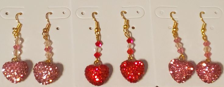 Rhinestone heart charm earrings with coordinating colored crystals. Matching bracelet available Heart Cut Charm Jewelry For Party, Party Jewelry With Heart Cut Charm, Heart Cut Jewelry With Heart Charm For Party, Heart-shaped Crystal Beaded Jewelry, Heart-shaped Party Jewelry, Double Heart Rhinestone Jewelry For Party, Adjustable Heart Charm Drop Earrings Jewelry, Heart-shaped Bling Jewelry For Party, Round Heart Charm Jewelry For Party