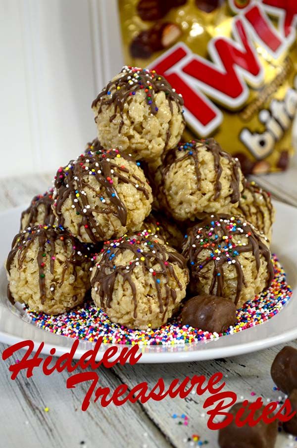 a white plate topped with chocolate covered cookies and sprinkles next to a bag of m & m's