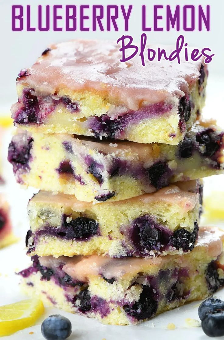 blueberry lemon blond blondies are stacked on top of each other with fresh blueberries