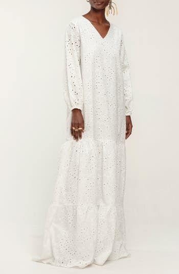 Dainty eyelets fleck the embroidered cotton fabric on this artful long dress that checks off the boxes on elegance and stylish drama. Slips on over head V-neck Long sleeves with elastic cuffs Lined 100% cotton Machine wash, line dry Made in Senegal Black Owned/Founded White Cotton Maxi Dress With Broderie Anglaise, Cotton Maxi Dress With Broderie Anglaise For Daywear, Eyelet Dress, Long Sleeve Maxi, Anniversary Sale, Nordstrom Dresses, Checks, Long Dress, White Dress