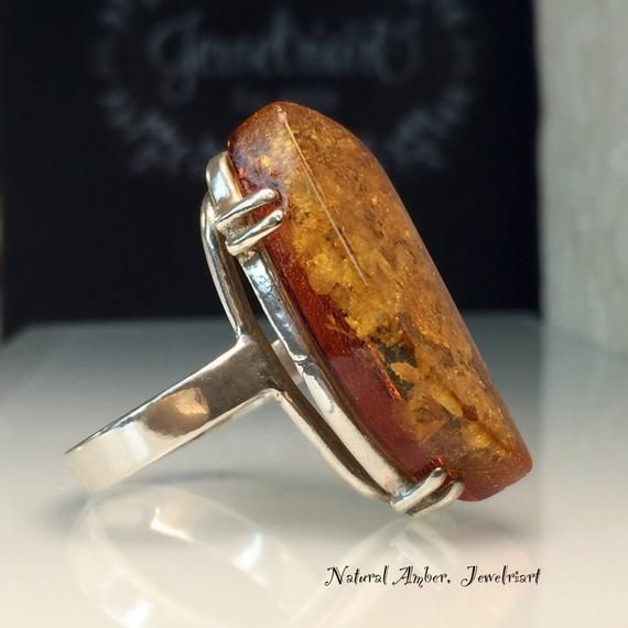 Freeform Organic Amber Ring. Unique Amber Ring. Modern Amber Ring. Artisan Amber Ring. Large Organic Amber Ring. Amber Statement Ring. Healing Amber Ring. Perfect Amber Lovers❤️ Gift. Stunning Artisan Prong Set Amber And Solid Sterling Silver Ring. This Beauty Measures 22mms or just under one inch Les Chakras, Free Market, Amber Ring, Light Of Life, Natural Amber, Topaz Earrings, Ancient Cultures, Herkimer Diamond, Eternity Band Diamond