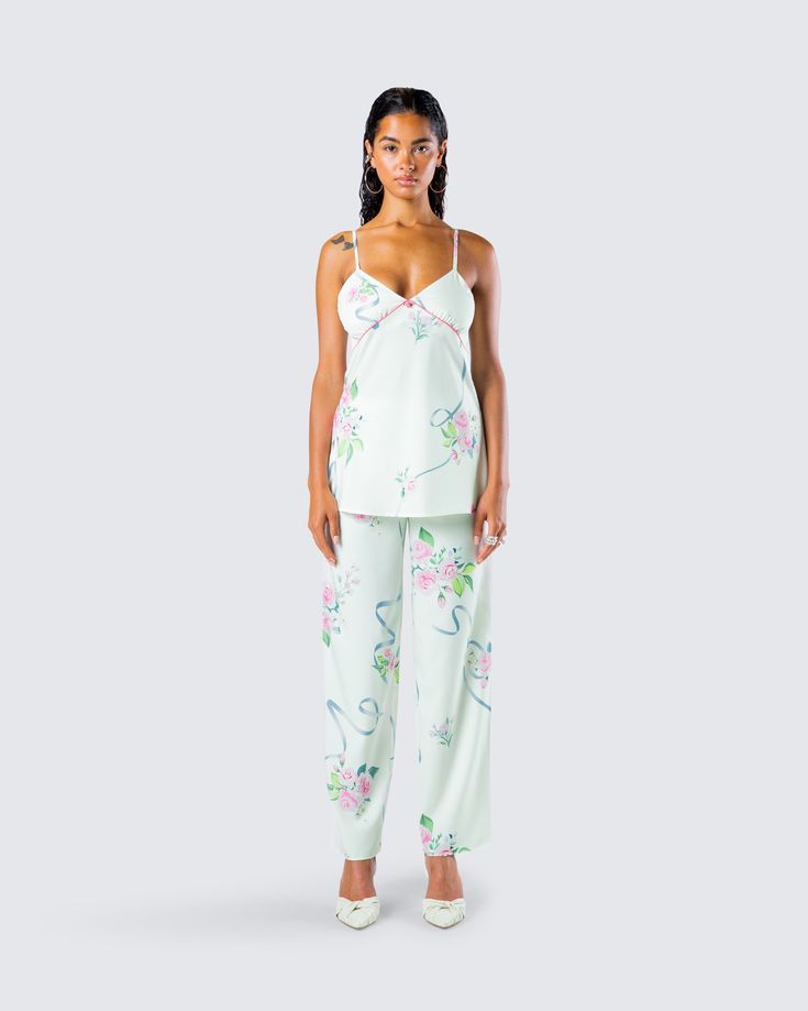 From getting your beauty rest to running around the town - this two-piece set will have you on your prettiest behavior 🤍 Pairing a cami top with matching wide leg pants, you'll stun in the perfect floral look 🤩 Green Sleepwear Sets For Spring, Summer Pajama Party Sets With Spaghetti Straps, Spring Loungewear Sets, Summer Cami Set For Pajama Party, Summer Camisole Set For Daywear, Spring Vacation Two-piece Pant Set, Spring Casual Camisole Set, Green Floral Print Pant Set For Spring, Spring Chic Loungewear Pant Set