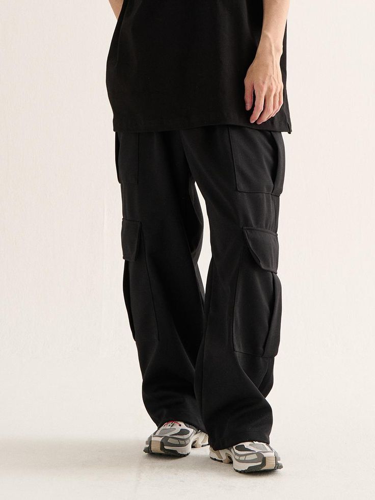 This is a casual and minimal pants by Analogmood that is made out of high quality and sturdy material. With distinctive mood of the design and comfortable wear, you can use it for your daily outfit.- Relaxed wide silhouette- Big cargo pockets detail on the side- Sweat fabric with soft touch and elasticity Relaxed Fit Wide Leg Cargo Sweatpants, Wide Leg Relaxed Fit Cargo Sweatpants, Black Wide Leg Full-length Pants With Relaxed Fit, Urban Wide-leg Sweatpants With Pockets, Wide Leg Trousers With Pockets, Urban Style Sweatpants With Pockets, Black Wide-leg Techwear Cargo Pants, Urban Wide-leg Cargo Style Sweatpants, Urban Wide Leg Cargo Sweatpants