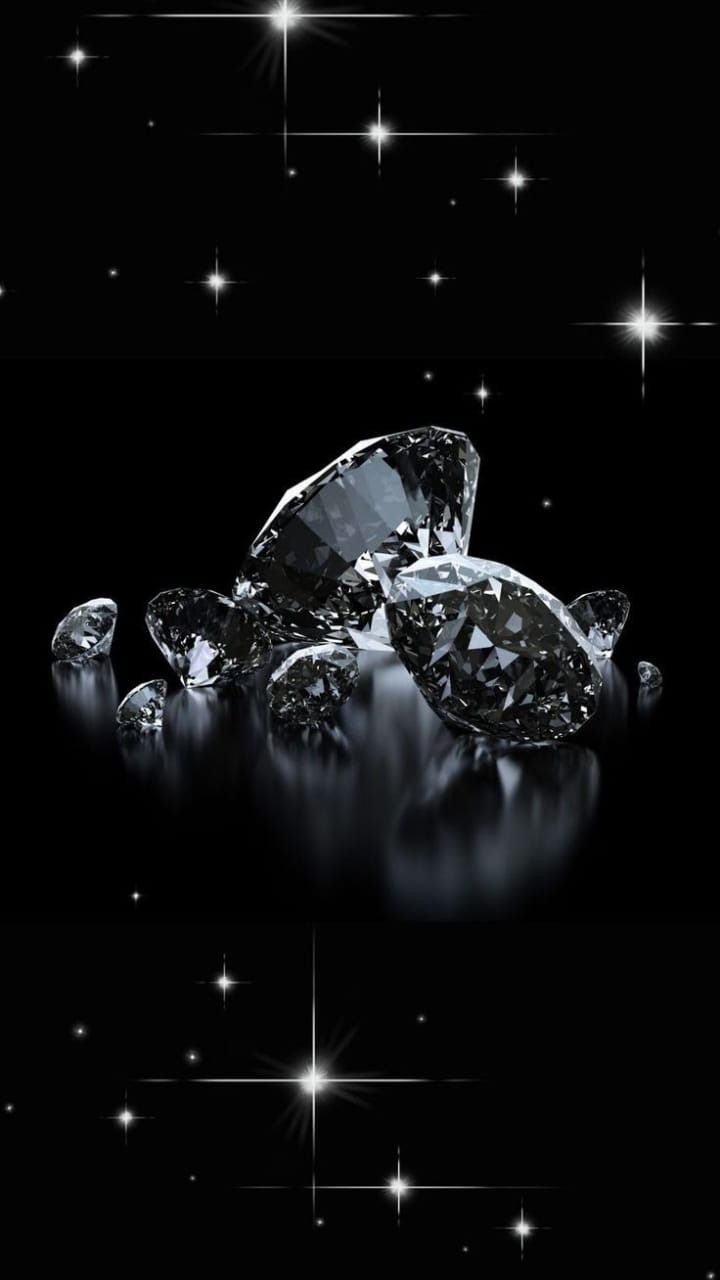 an image of some diamonds in the dark