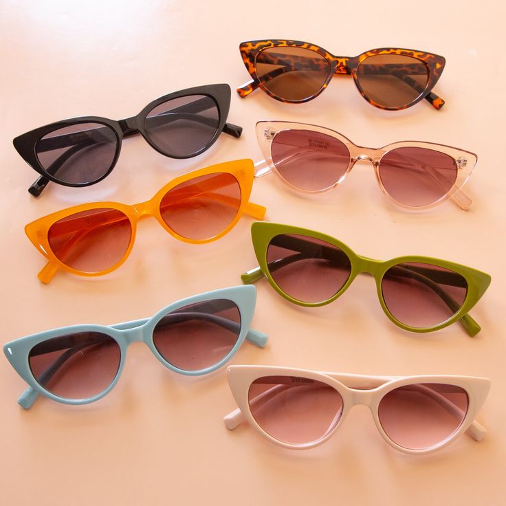 Introducing the Frenchie Sunglasses in the shade Fern. Add a touch of sophistication to any outfit with these adorable sunnies. Featuring a green hue and a wearable, everyday cat-eye shape, the Frenchie Sunglasses are a must-have addition to your accessory collection. Casual Cat Eye Sunglasses For Summer, Retro Cat Eye Sunglasses For Summer, Green Cat Eye Sunglasses For Summer, Green Cat Eye Sunglasses For Spring, Trendy Cat Eye Sunglasses With Tinted Lenses, Spring Cat Eye Sunglasses With Polarized Lenses, Retro Cat Eye Sunglasses With Polarized Lenses For Vacation, Retro Cat Eye Sunglasses With Polarized Lenses For Summer, Retro Polarized Cat Eye Sunglasses For Summer