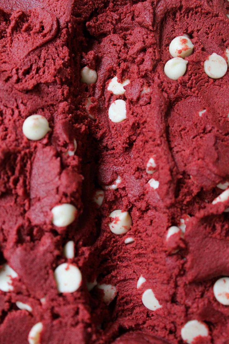 red ice cream with white sprinkles on it