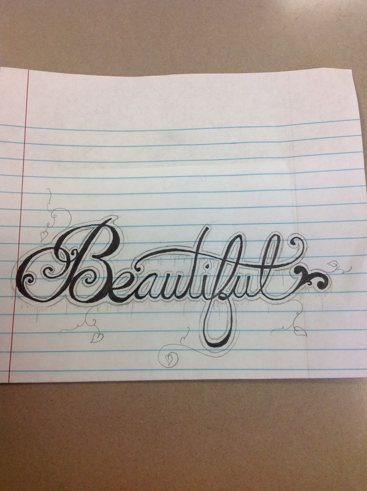 the word beautiful written in cursive writing on lined paper