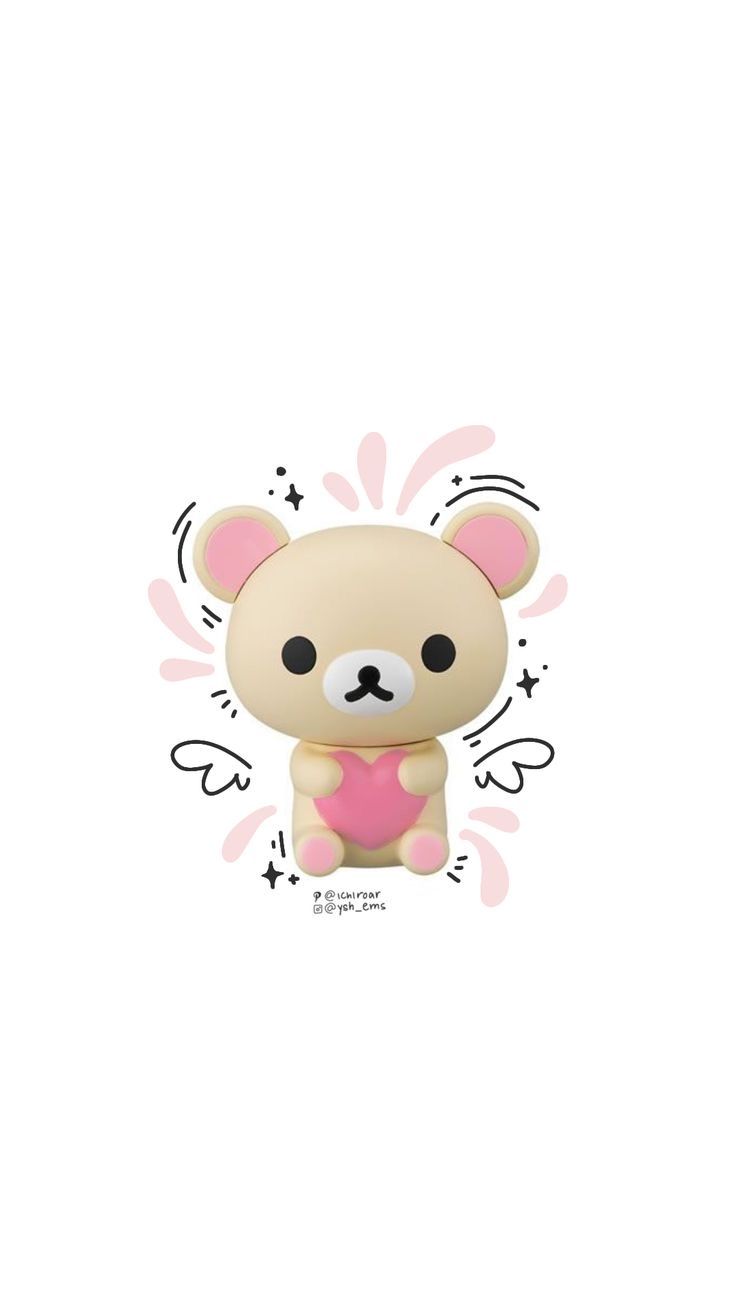 a small teddy bear holding a pink heart